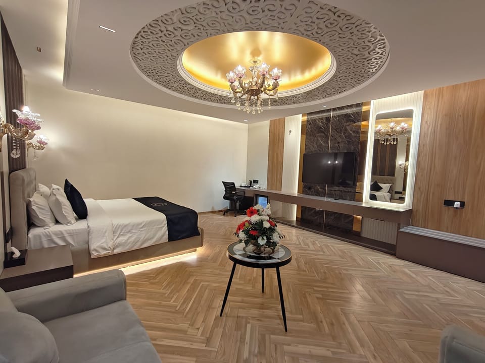 Superior Triple Room, City View | In-room safe, desk, laptop workspace, iron/ironing board
