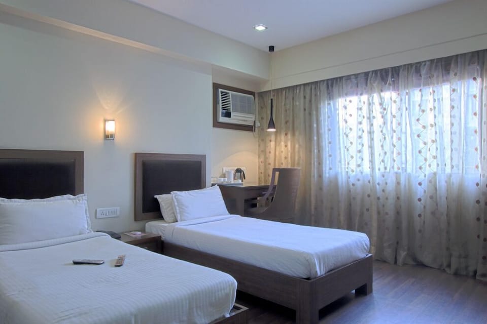 Standard Double Room, City View | Minibar, desk, free WiFi, bed sheets