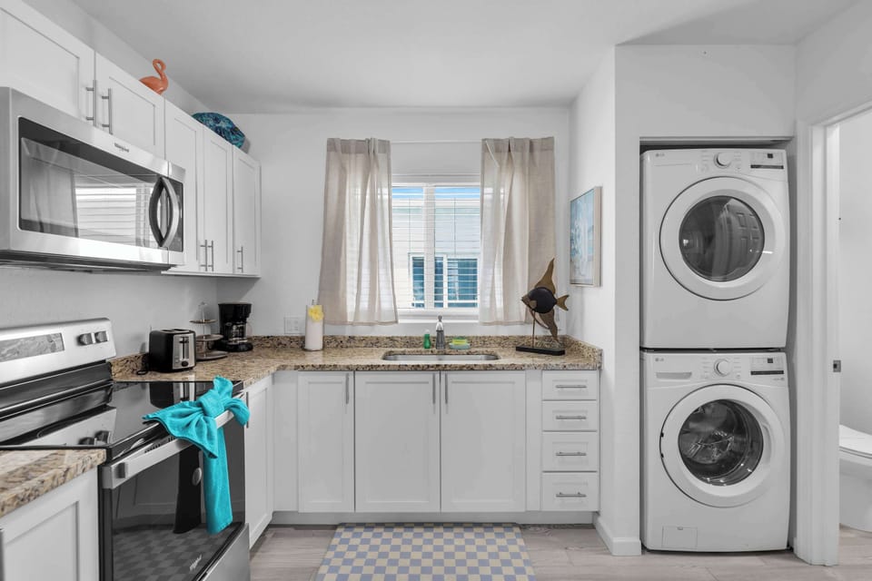 Full kitchen with in-home laundry