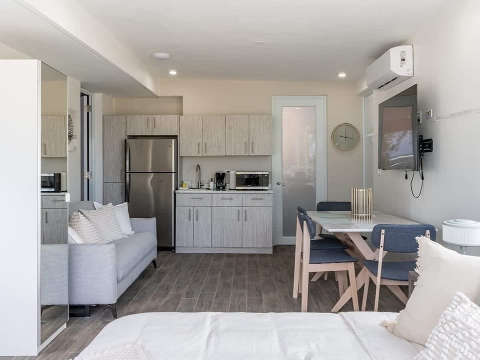 Studio 7 - King Bed, Cabinet, Sofa Bed, Dining / Work Area, Kitchenette, Full Bathroom