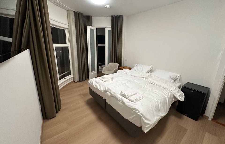 Deluxe Double Room, Private Bathroom, Canal View | Laptop workspace, WiFi (free), bed sheets