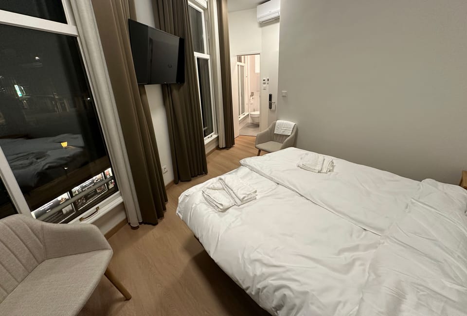 Deluxe Double Room, Private Bathroom, Canal View | Laptop workspace, free WiFi, bed sheets