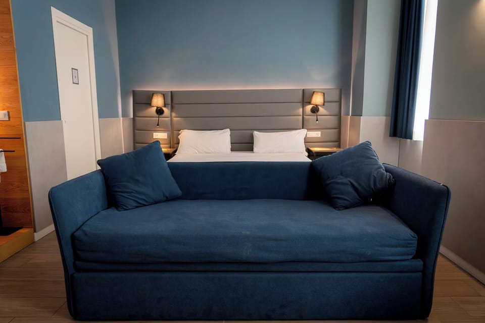 Deluxe Quadruple Room | Desk, laptop workspace, free WiFi
