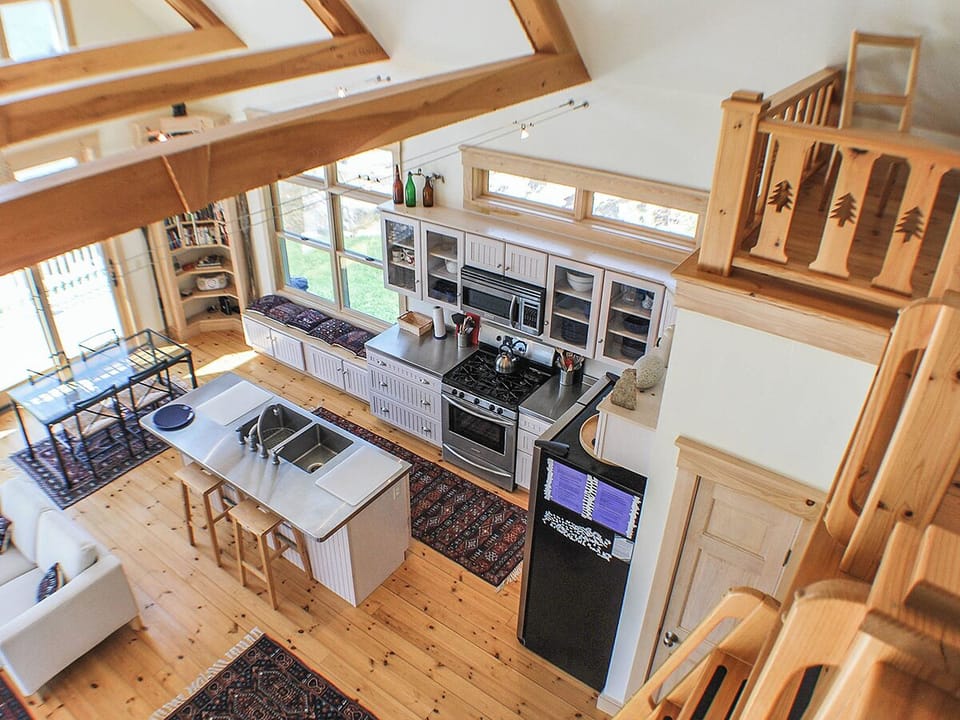 Looking down from the loft at the main living area