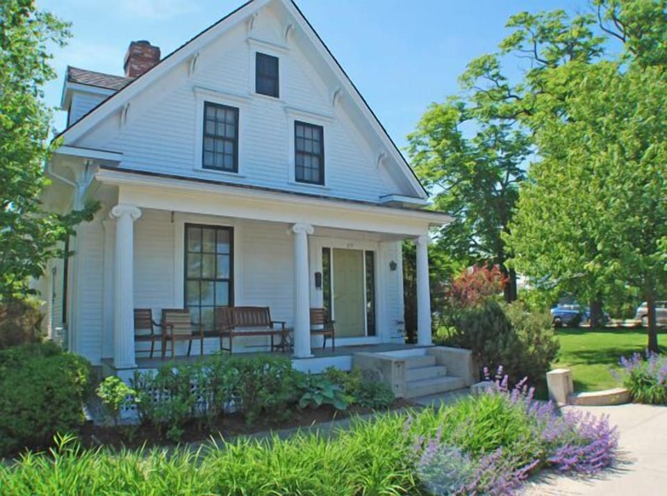 The front porch and house from the street