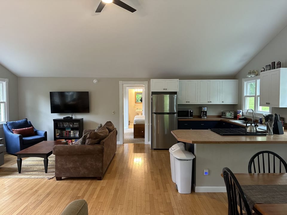The living area includes a TV with DVD and Satellite service