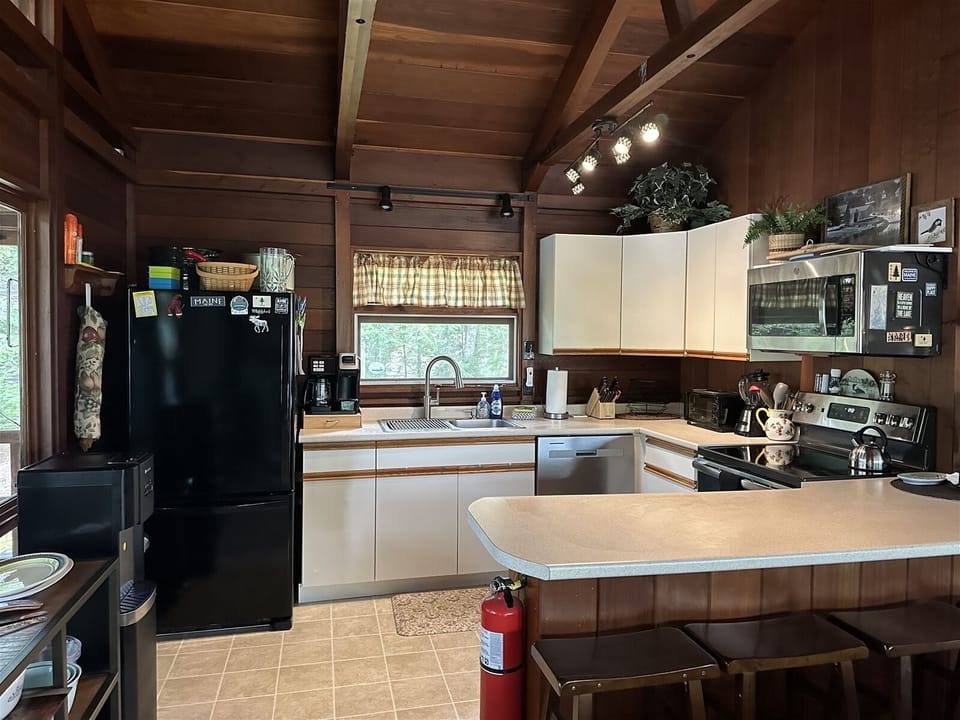 Kitchen area with newly updated stainless steel appliances