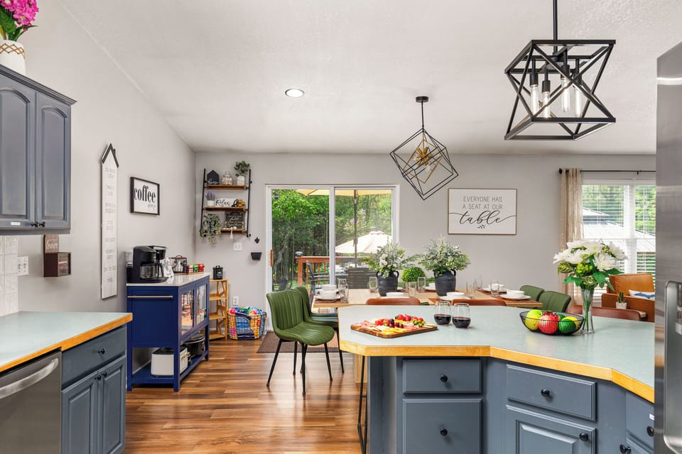 Open concept kitchen, to dining room, to outside deck/backyard. Plenty of space