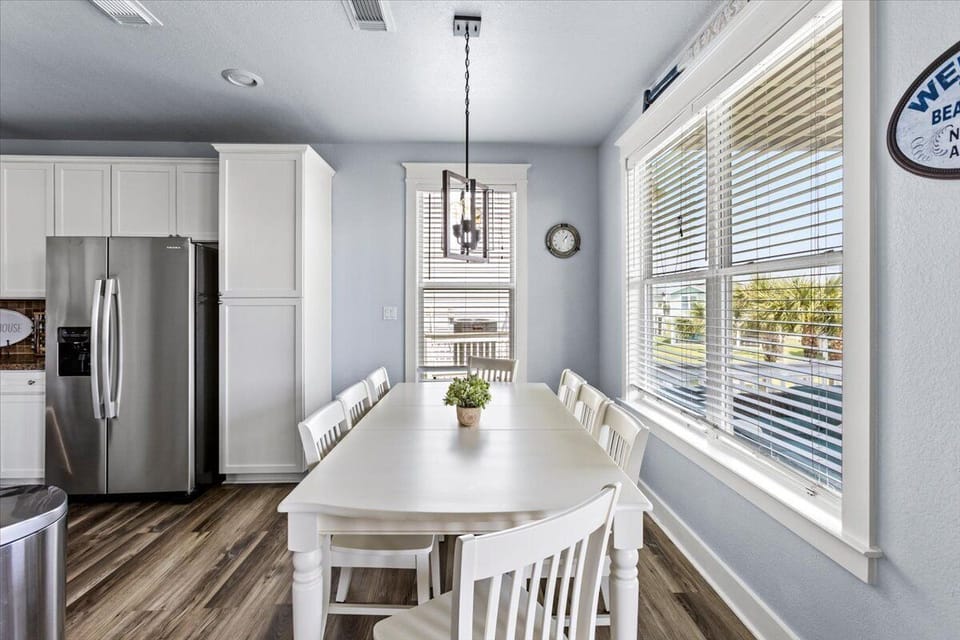 Enjoy the sunny views and coastal charm at this spacious table. 