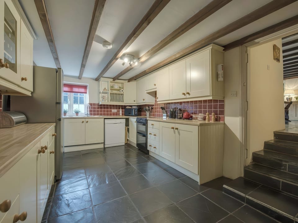 Fridge, microwave, dishwasher, cookware/dishes/utensils