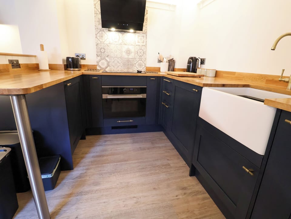 Fridge, toaster, cookware/dishes/utensils