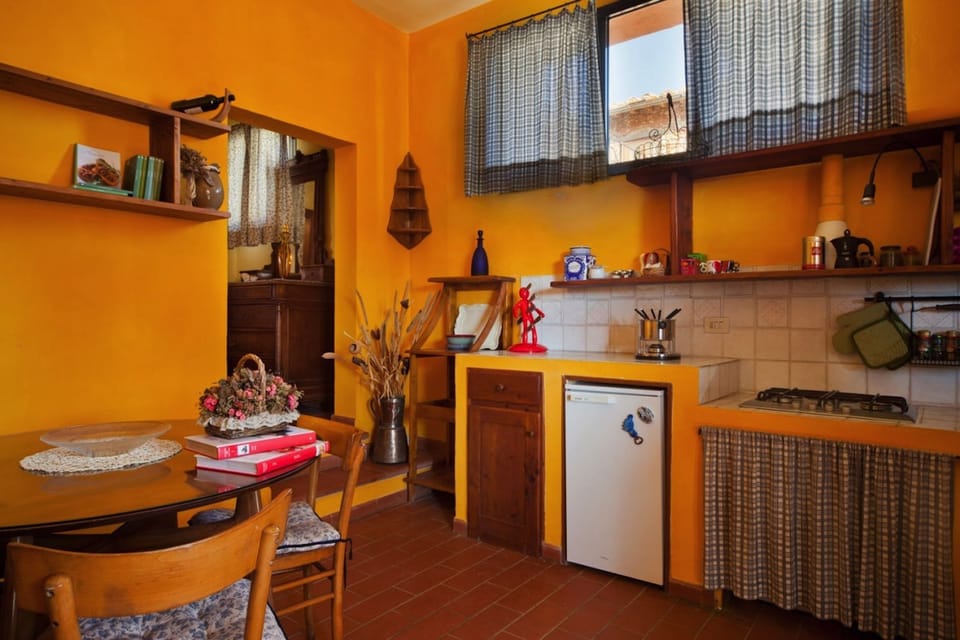 Apartment, 1 Bedroom, Non Smoking, Garden View (Clizia) | Private kitchenette | Cookware/dishes/utensils
