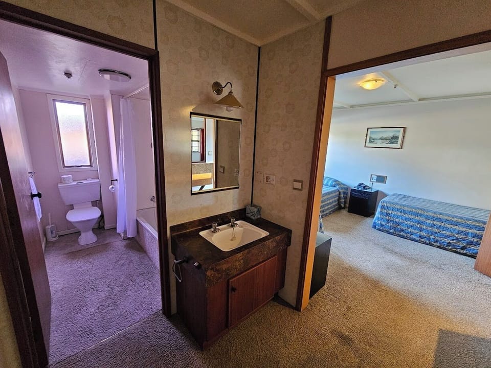 Standard Triple Room, Non Smoking | Bathroom | Combined shower/tub, hair dryer, towels