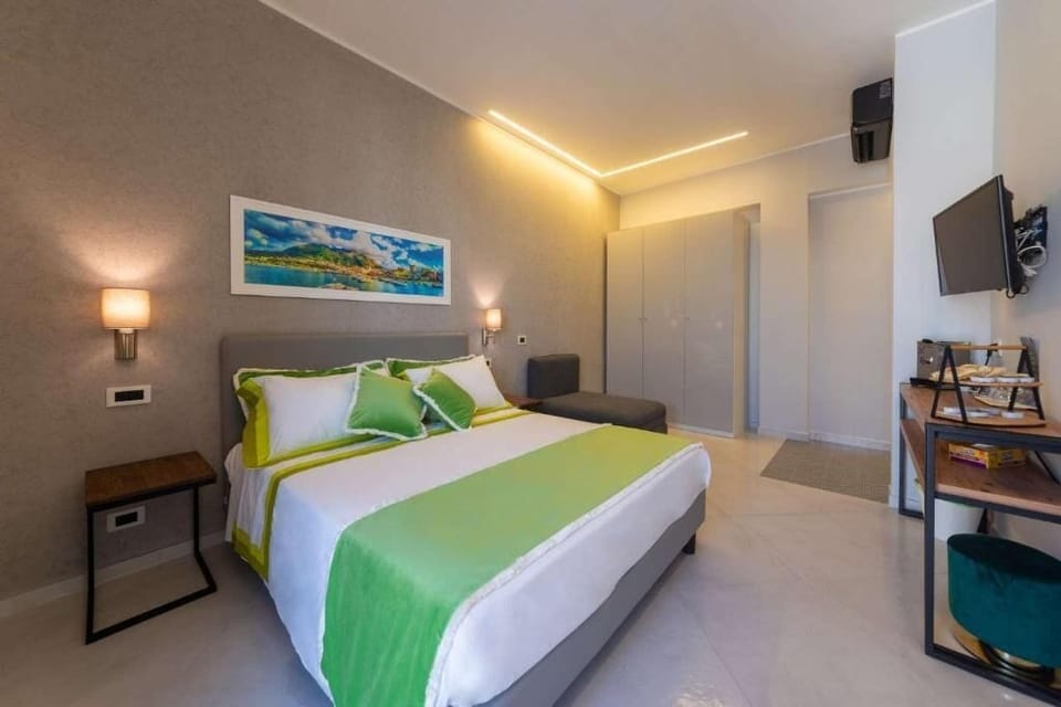 Deluxe Room, Balcony | In-room safe, blackout drapes, soundproofing, iron/ironing board