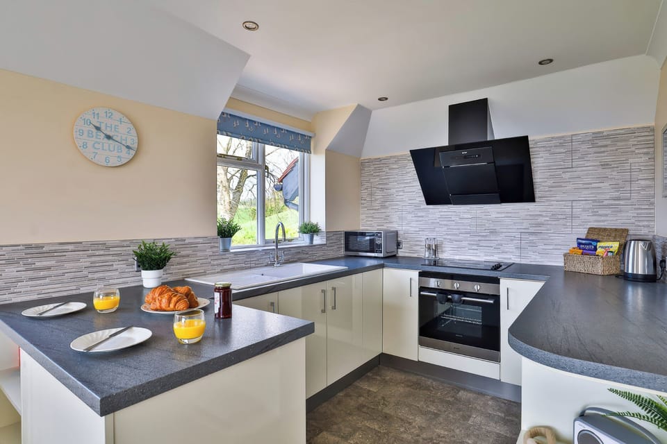 Fridge, microwave, toaster, cookware/dishes/utensils