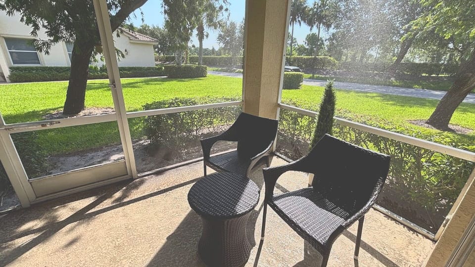 Take in the serene, park-like views from the comfort of your patio, complete with relaxed seating and a private look at the lush, green neighborhood landscaping.
