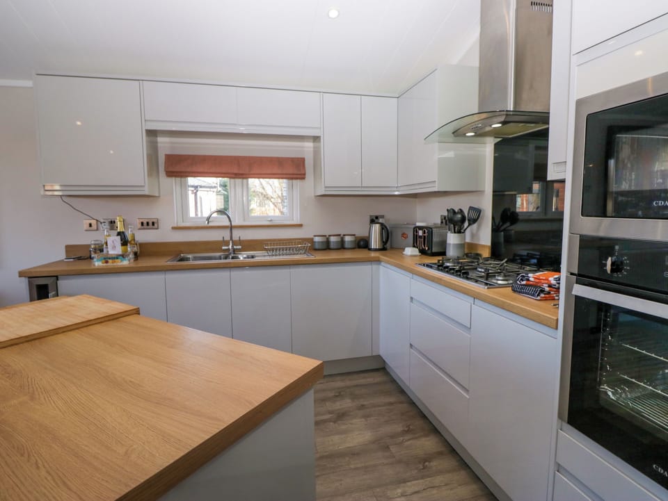 Fridge, microwave, toaster, cookware/dishes/utensils