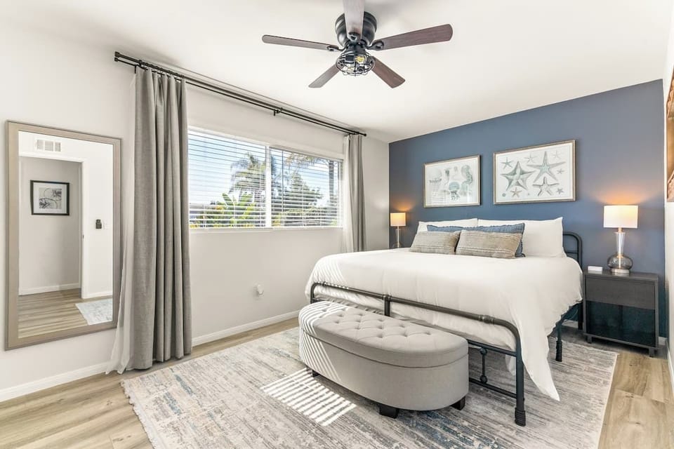 Bedroom 3 includes a king sized bed, blackout curtains, and full length mirror.