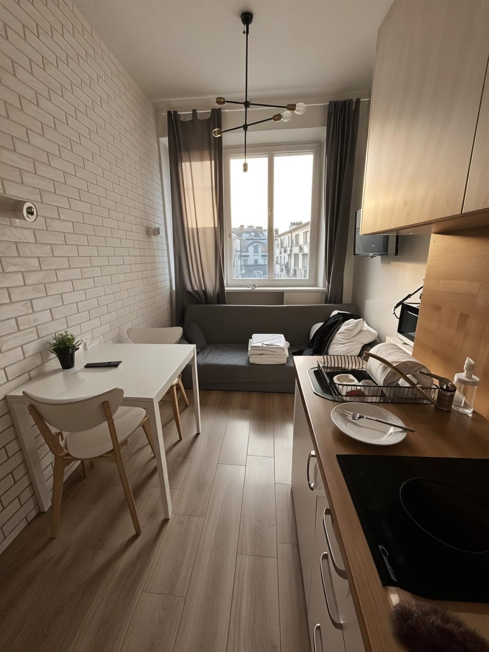 Comfort Studio, Multiple Beds, Kitchenette, Courtyard View | Living area