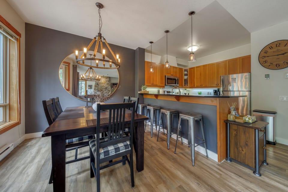 Large dining table with six chairs , breakfast  bar with 4 stools 