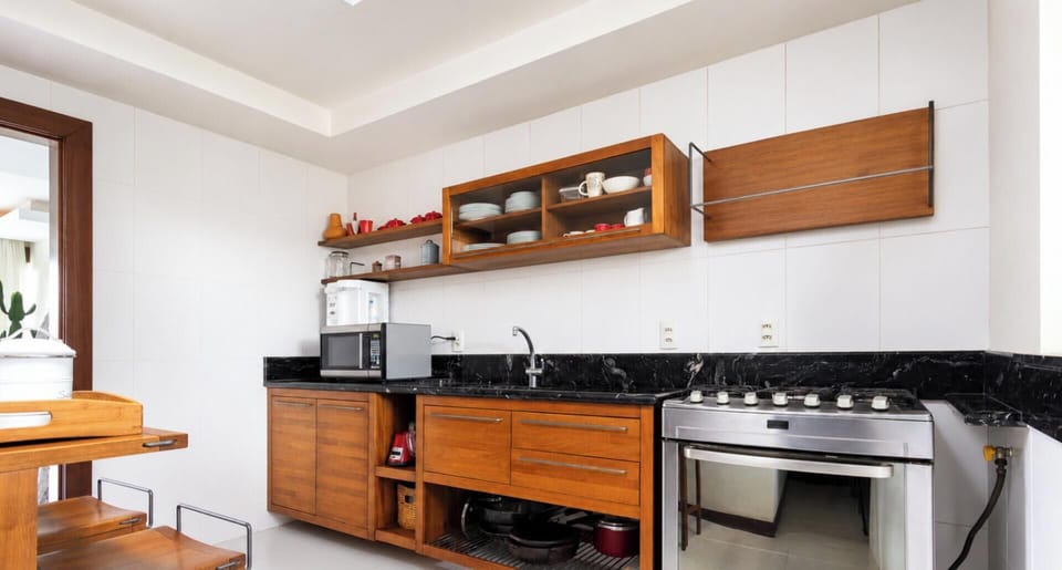 Villa | Private kitchen | Fridge, microwave, oven, stovetop