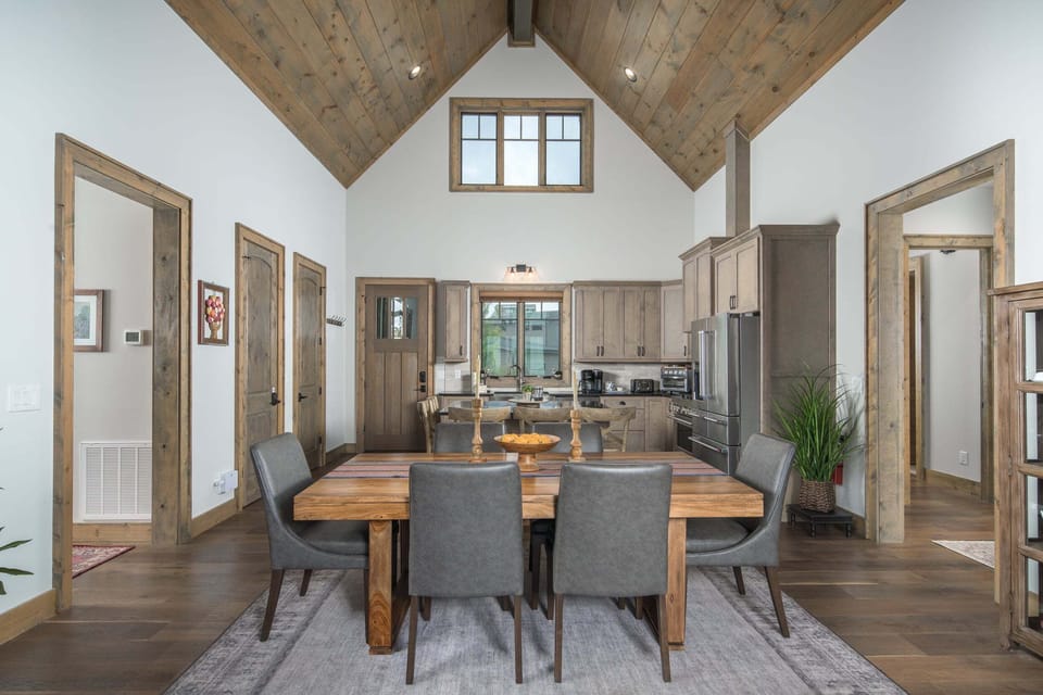Dining area with vaulted ceilings and easy access to the kitchen