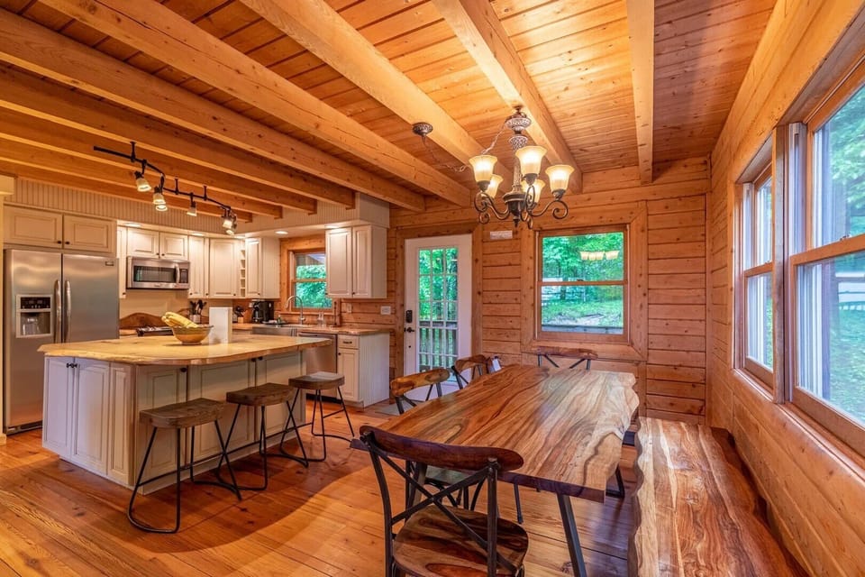 Dining Table seats up to Seven Guests, plus Three More at Adjacent Bar Top