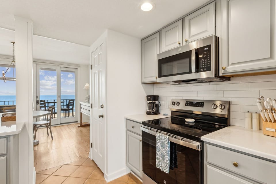 Luxury Kitchen with Quartz Countertops and Stainless Steel Appliances