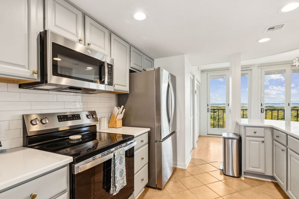 Luxury Kitchen with Quartz Countertops and Stainless Steel Appliances