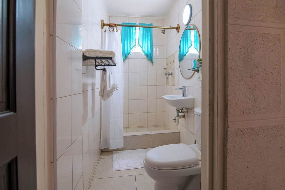 Private bathroom with shower, ready for your use.
