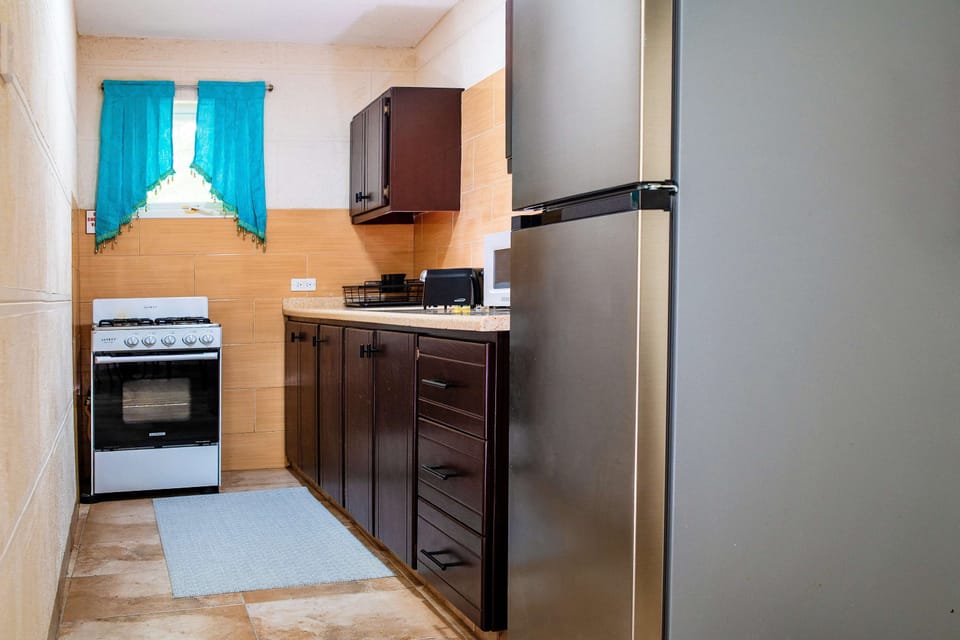 Fully equipped kitchenette for easy meal preparation.