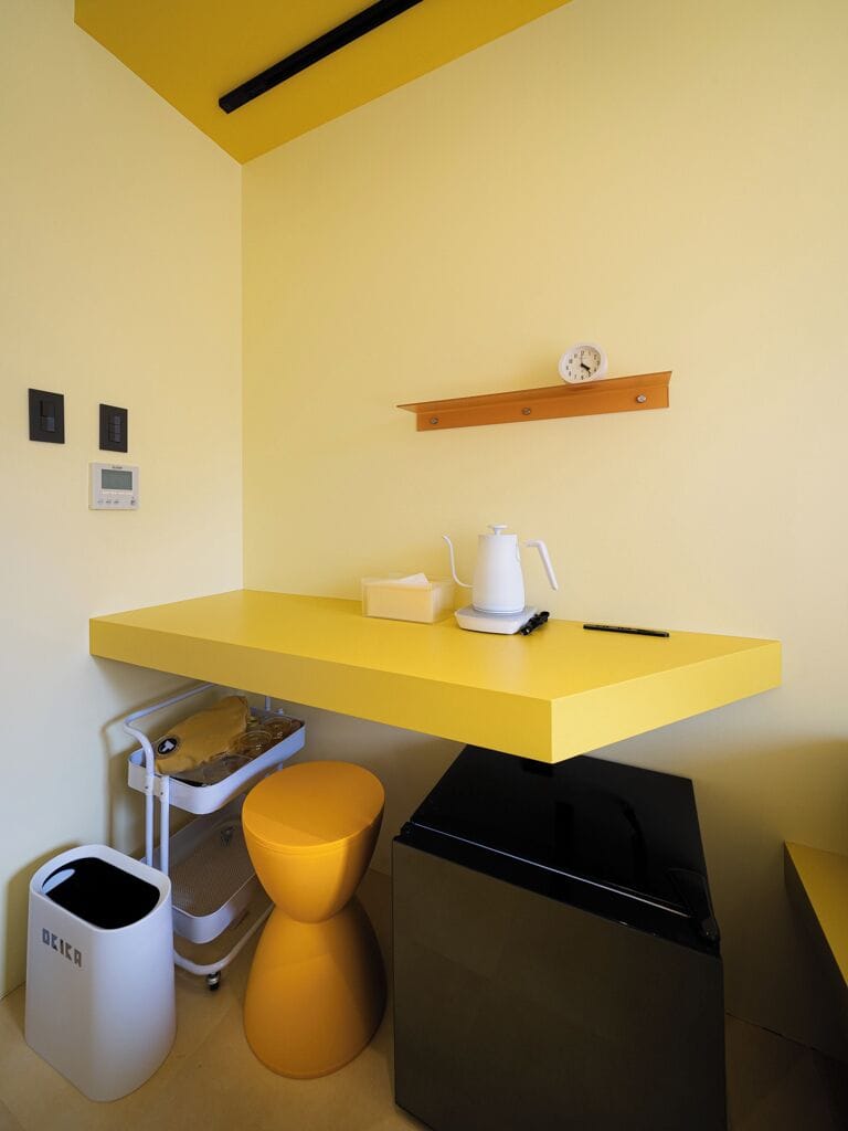 Yellow with Shared Bathroom | In-room safe, desk, laptop workspace, blackout drapes
