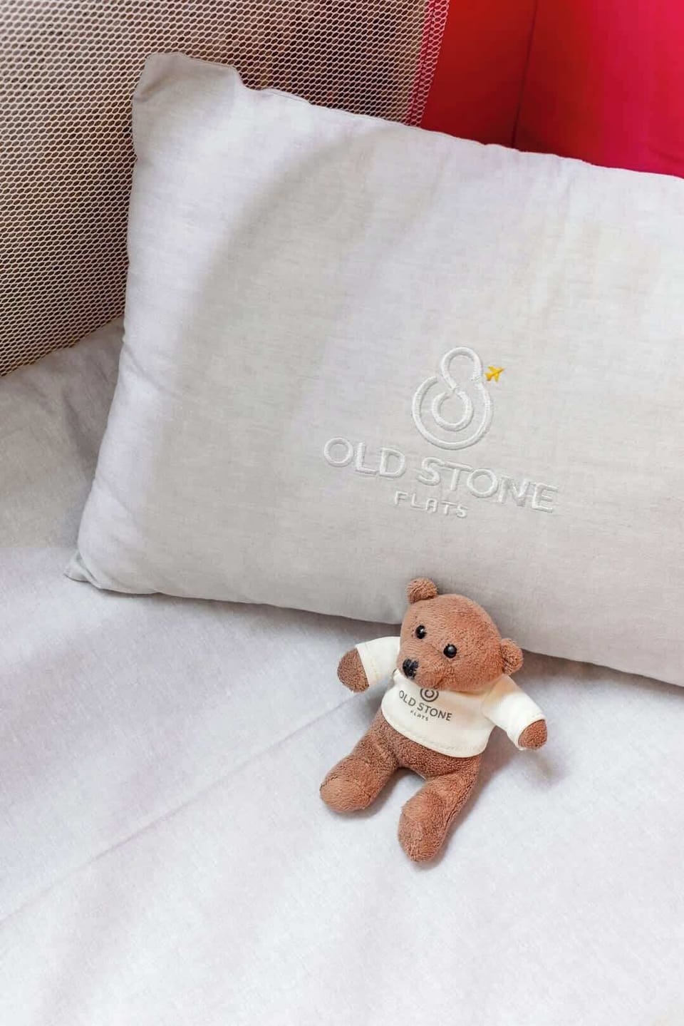 There is a baby bed, high chair, baby bathtub, and toys for the little guests.