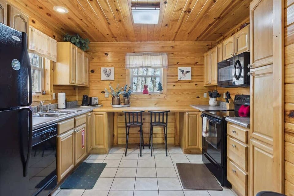 Bright Kitchen: Whip up culinary delights in a charming, wood-accented kitchen with modern amenities!