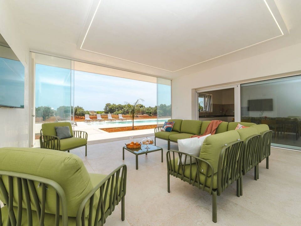 Furniture, Interior Design, Flooring, Floor, Chair, Ceiling, Table, Shade, Couch