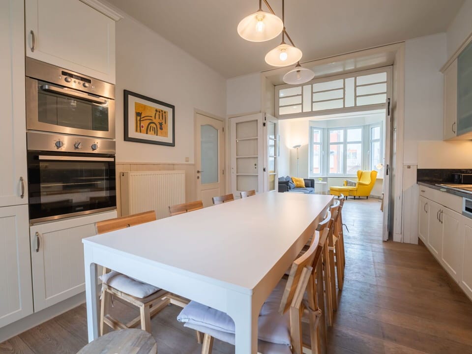 Furniture, Interior Design, Flooring, Floor, Countertop, Ceiling, Wood, Kitchen, Cabinetry, Light Fixture
