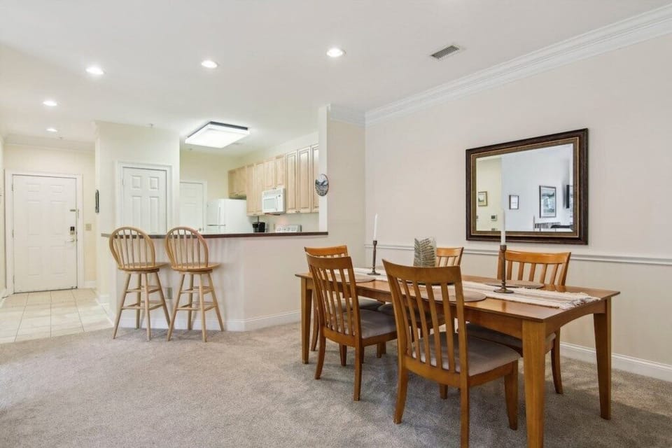 7 Dining Area and view to Kitchen Breakfast Bar