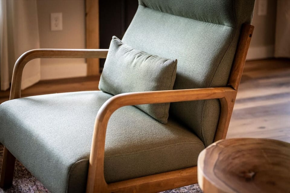 Relax in a plush reading chair that invites you to kick back with a cup of coffee or your favorite book in hand.
