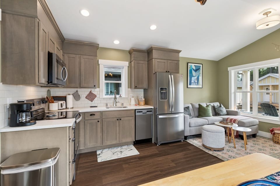 Open concept kitchen, living, and dining rooms