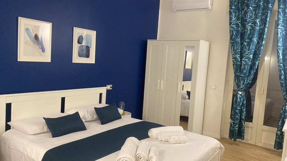Deluxe Triple Room, Balcony | In-room safe, desk, blackout drapes, free WiFi