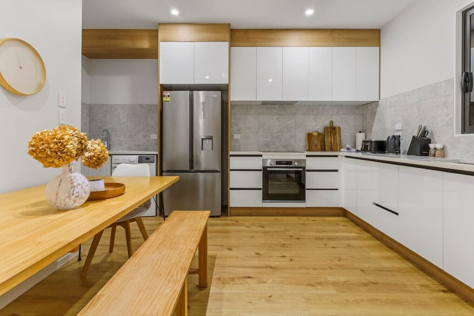 The dining table is located in the kitchen area - handy for meals.