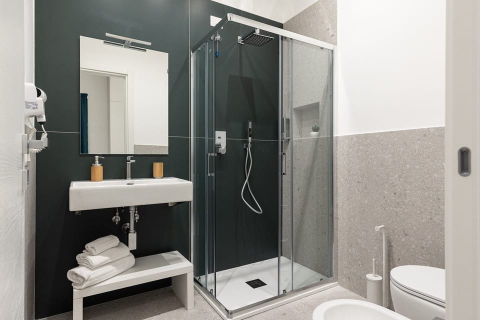 Standard Room | Bathroom | Shower, hair dryer, bidet, towels