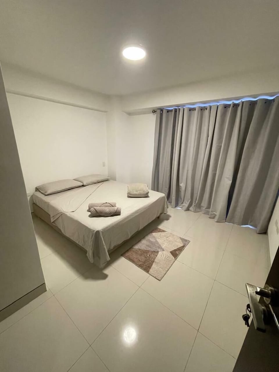 Bedroom with balcony access
