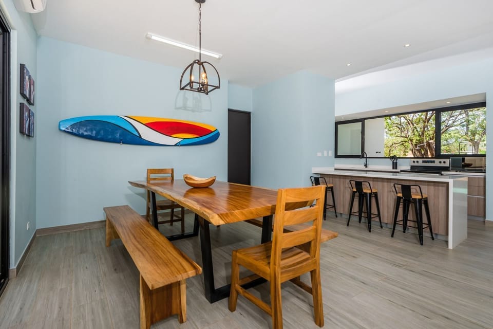 Dining area with open kitchen.