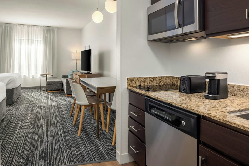 Premium bedding, pillowtop beds, desk, laptop workspace