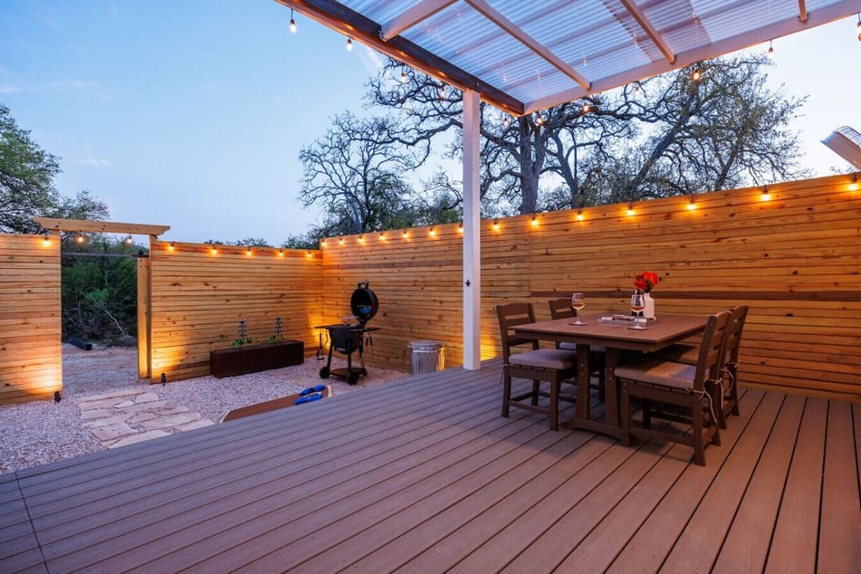 Outdoor Dining Area: Enjoy meals under twinkling lights in this serene, private space!