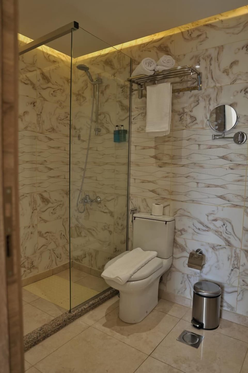 Shower, hydromassage showerhead, eco-friendly toiletries, hair dryer