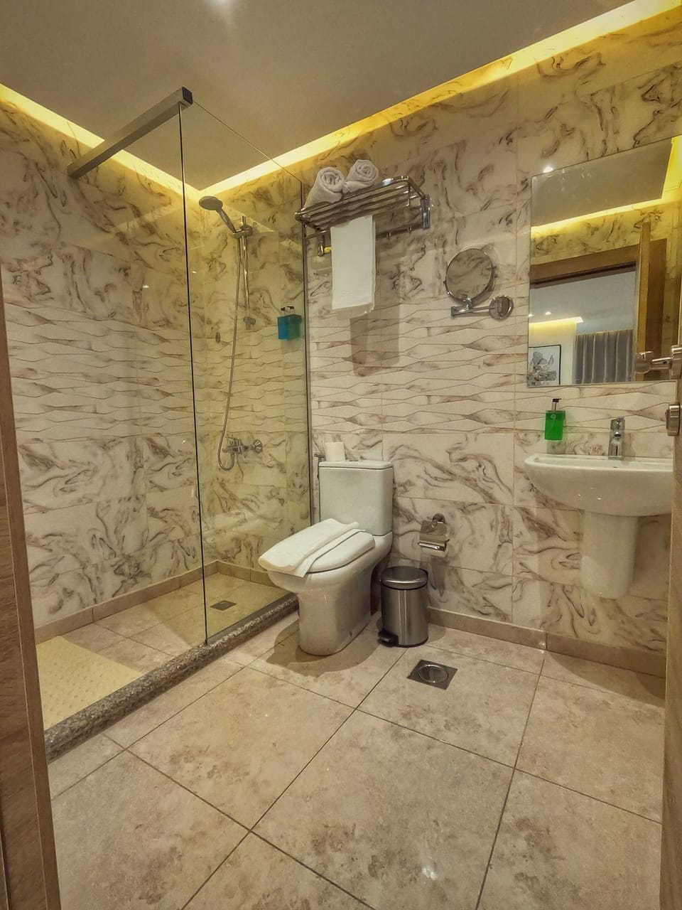 Shower, hydromassage showerhead, eco-friendly toiletries, hair dryer