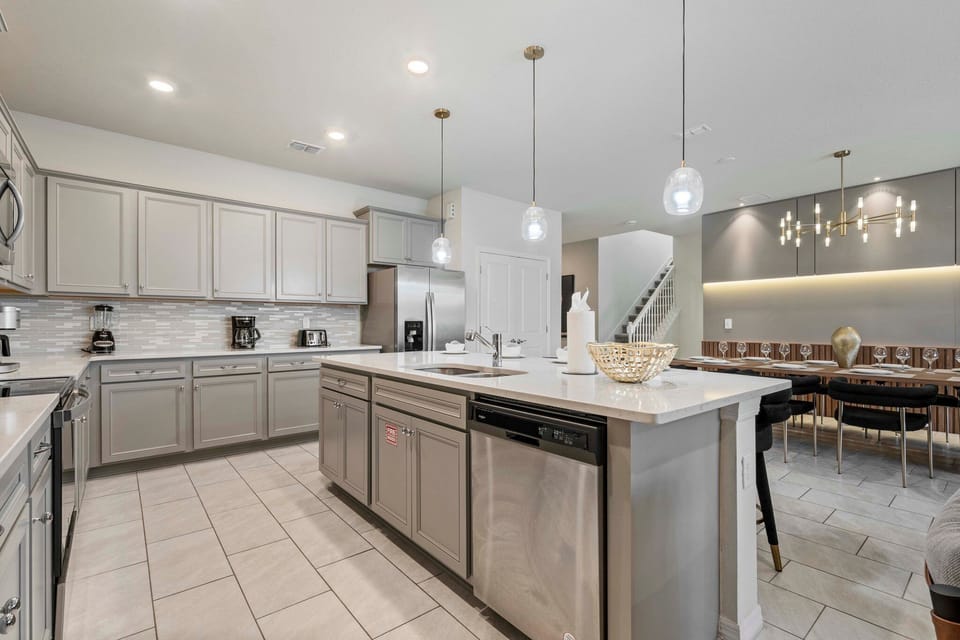 The kitchen is fully stocked for a entertaining a large group.