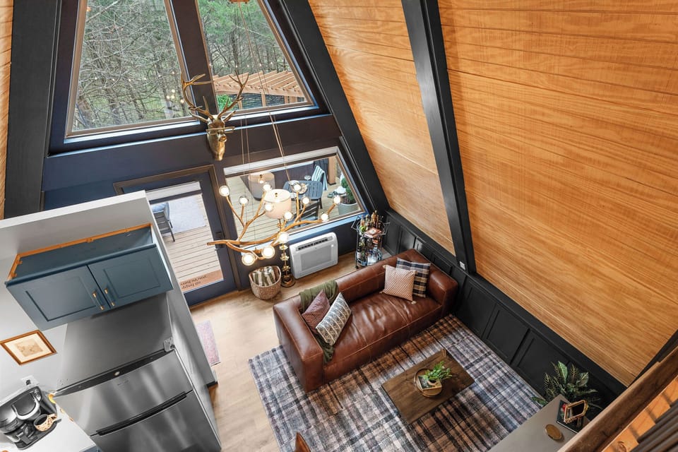 Sunlight pours into the open concept living room and kitchen